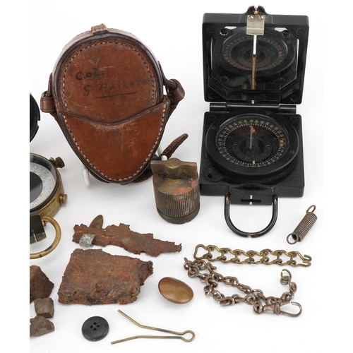 1400 - Militaria including two military issue compasses, one World War I Anglo-Swiss Association example wi... 