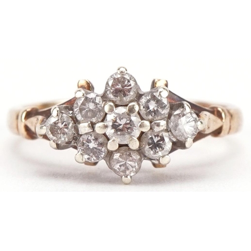 3344 - 9ct gold diamond flower head ring, size J, 2.3g