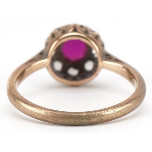 3402 - 9ct gold ruby and clear stone cluster ring, size L, 2.5g