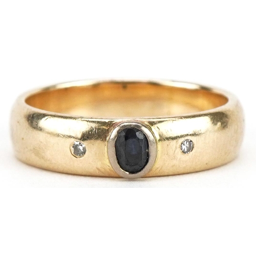 3052 - Unmarked gold sapphire and diamond three stone ring, tests as 18ct gold, size O, 4.8g