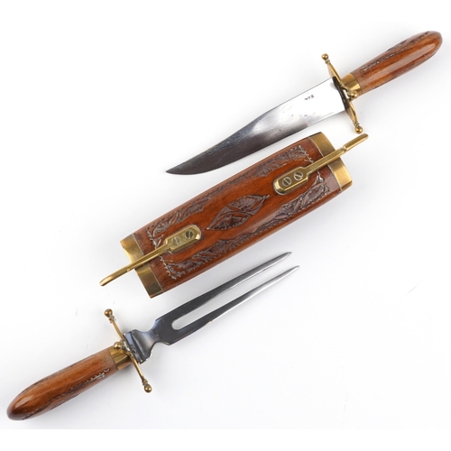 2393 - Indian table carving knife and fork with hardwood case carved with foliage, 35.5cm wide