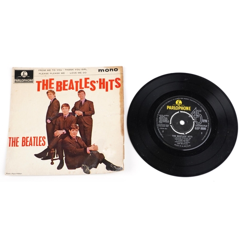 1045 - Three The Beatles 45rpm records comprising A Hard Day's Night, The Beatles Hits and Twist and Shout