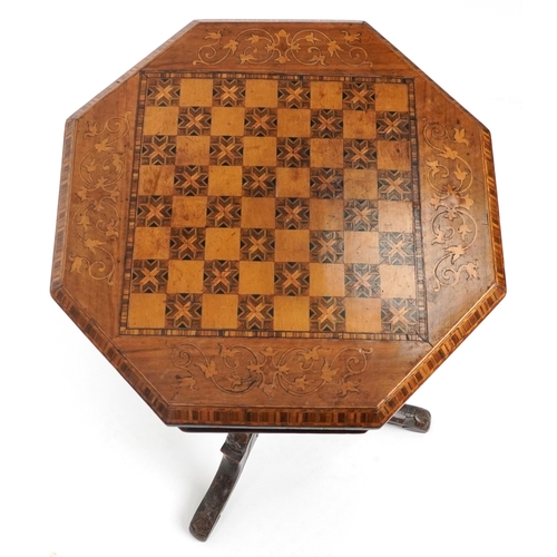 2043 - Victorian inlaid walnut octagonal trumpet work games table with parquetry and marquetry inlaid top a... 