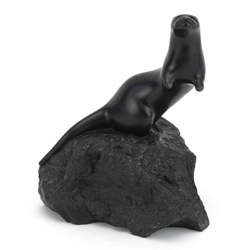 424 - Inuit interest study of an otter, indistinctly signed, 19cm high