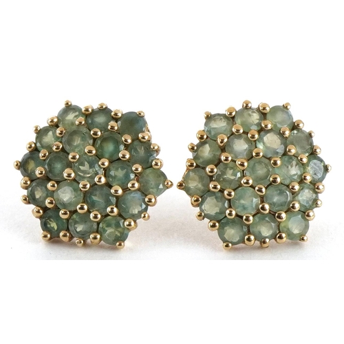 3096 - Pair of 9ct gold green topaz three tier cluster stud earrings, 1.3cm wide, 3.2g