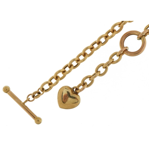 3083 - 9ct gold watch chain with T bar and love heart fob, 50cm in length, 15.4g