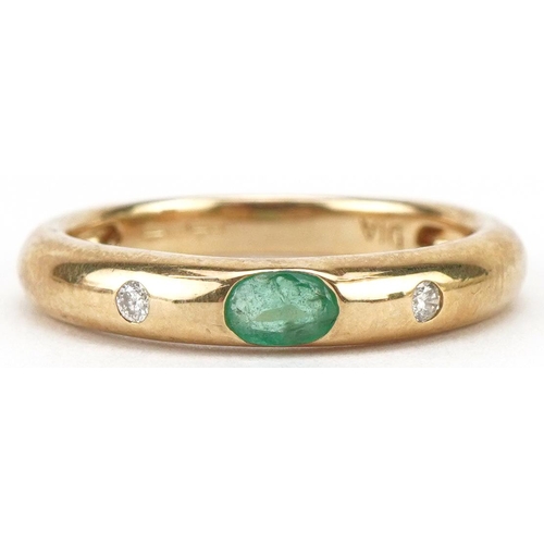 3057 - 9ct gold emerald and diamond three stone ring, size O, 2.8g