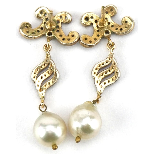 3003 - Pair of antique unmarked gold diamond and Baroque pearl drop earrings, tests as 18ct gold, 3.7cm hig... 