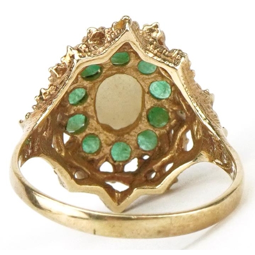 3095 - 9ct gold cabochon opal and emerald four tier cluster ring with pierced setting, size Q, 4.4g