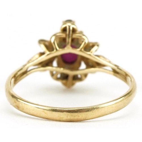 3354 - 14ct gold ruby and diamond floral ring, size O, 2.2g