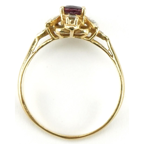 3354 - 14ct gold ruby and diamond floral ring, size O, 2.2g