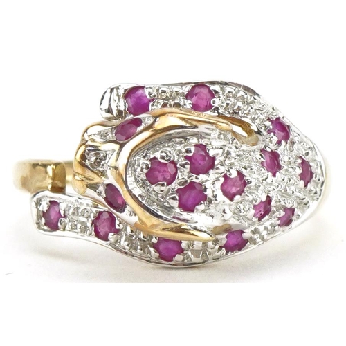 3330 - 9ct gold diamond and ruby leopard ring, size O, 2.9g