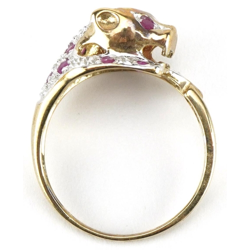 3330 - 9ct gold diamond and ruby leopard ring, size O, 2.9g