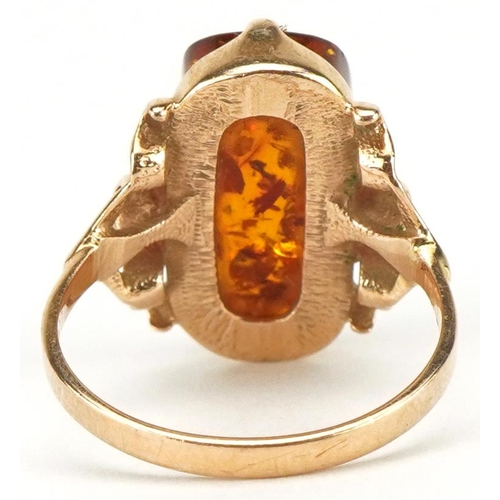 3145 - Russian 14ct gold natural amber ring with ornate pierced setting, size M, 3.7g