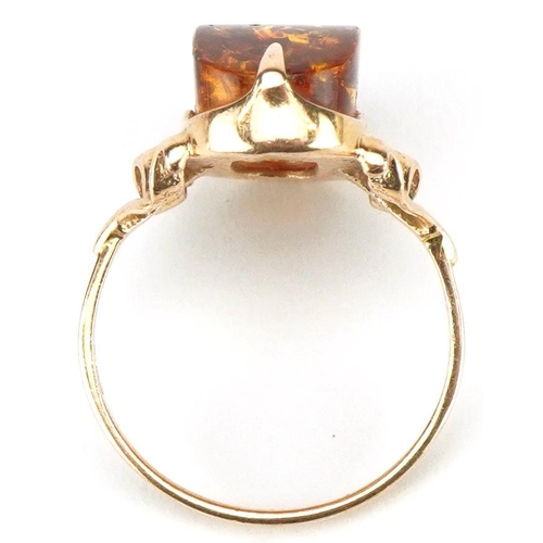 3145 - Russian 14ct gold natural amber ring with ornate pierced setting, size M, 3.7g