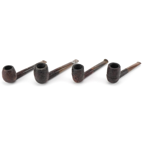 1259 - Four Dunhill briar Shell tobacco smoking pipes arranged in a lightwood pipe rack, the pipe rack 20cm... 