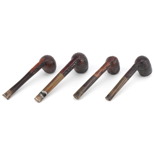 1259 - Four Dunhill briar Shell tobacco smoking pipes arranged in a lightwood pipe rack, the pipe rack 20cm... 