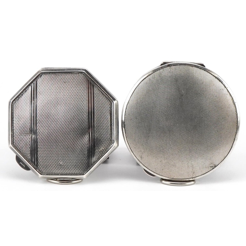 128 - Two Art Deco style silver engine turned compacts, the largest 6.8cm in diameter, total 152.0g