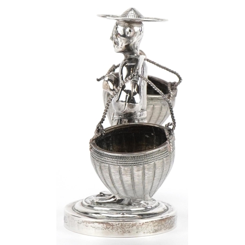 73 - Wang Hing, Chinese export silver cruet in the form of a Chinaman carrying baskets, 10.5cm high, 137.... 