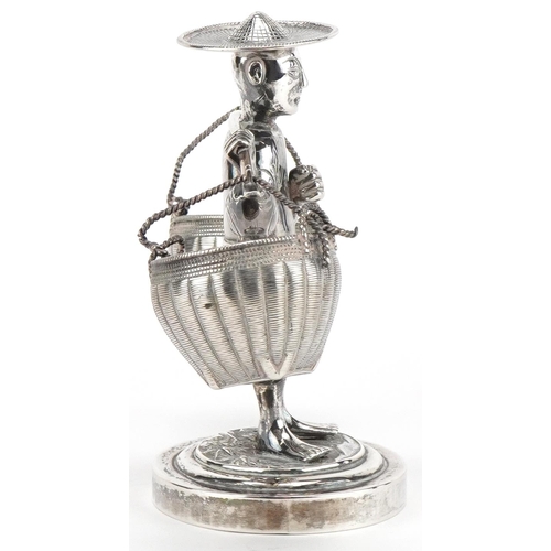 73 - Wang Hing, Chinese export silver cruet in the form of a Chinaman carrying baskets, 10.5cm high, 137.... 