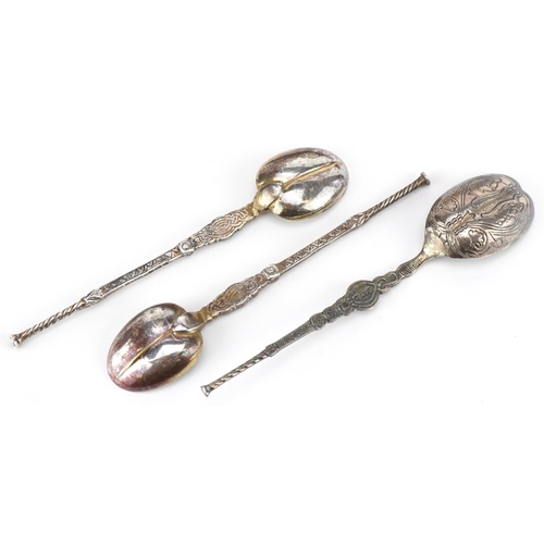 633 - Three Edwardian and later silver anointing spoons including Coronation 1937 example with fitted case... 