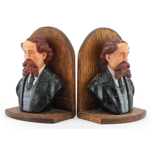 2418 - Pair of oak and hand painted plaster figural bookends, each 19cm high