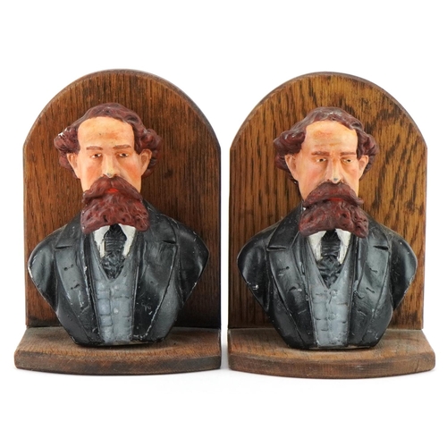 2418 - Pair of oak and hand painted plaster figural bookends, each 19cm high