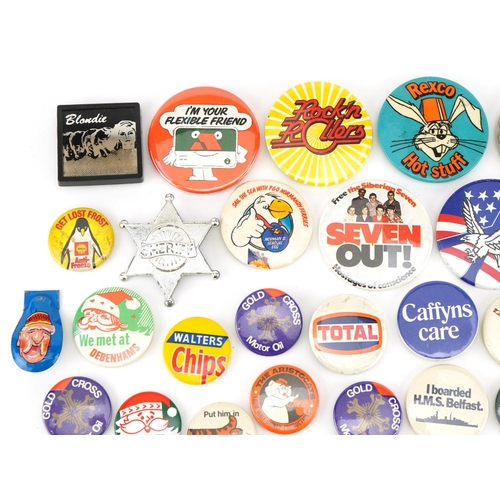 1637 - Collection of vintage and later pin badges including I'm Your Flexible Friend, I Boarded HMS Belfast... 