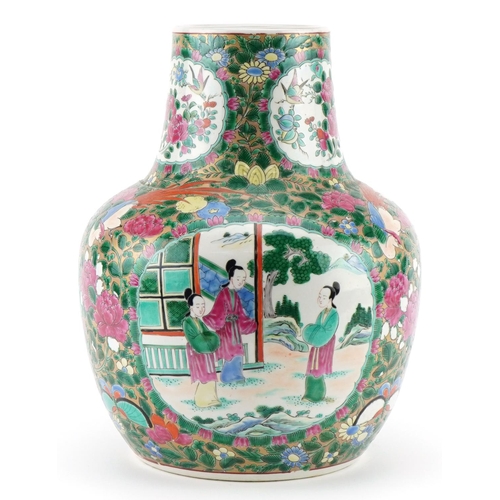 595 - Chinese Canton porcelain vase hand painted in the famille rose palette with panels of figures and fl... 