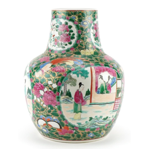 595 - Chinese Canton porcelain vase hand painted in the famille rose palette with panels of figures and fl... 