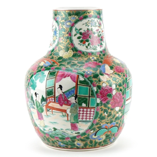 595 - Chinese Canton porcelain vase hand painted in the famille rose palette with panels of figures and fl... 