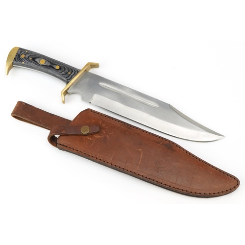 1422 - Bowie type knife with leather sheath, steel blade and marbleised handle, 44.5cm in length