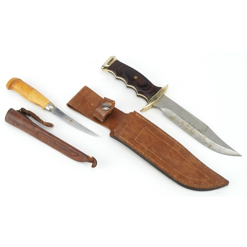 1423 - Spanish hunting knife with leather sheath and a Finnish skinning knife by Narttiini, 32cm in length