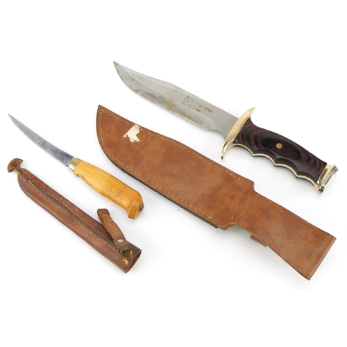 1423 - Spanish hunting knife with leather sheath and a Finnish skinning knife by Narttiini, 32cm in length