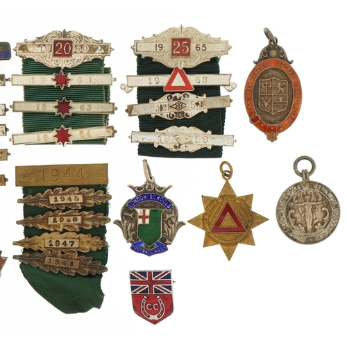 1633 - Driving and sports jewels, some silver, including Safe Driving awards with bars and ribbons, two sil... 