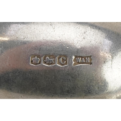 2413 - Sporting interest teaspoons comprising two silver golfing interest and three silver plated and ename... 