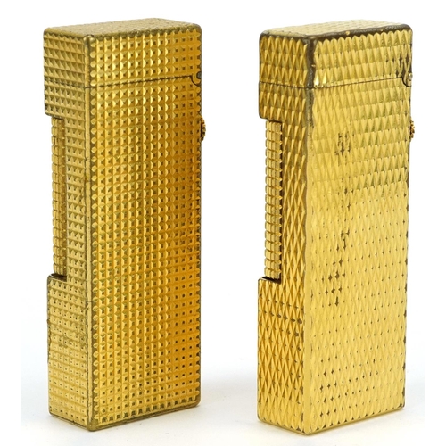 619 - Two Dunhill gold plated pocket lighters with engine turned bodies