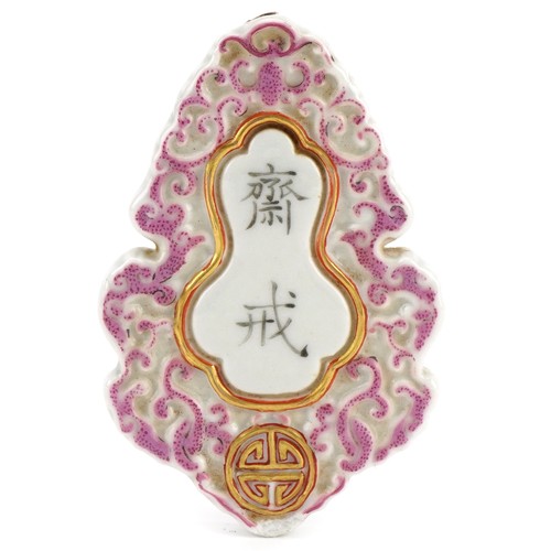 725 - Chinese porcelain pendant with gourd motif hand painted with calligraphy, 7cm in length