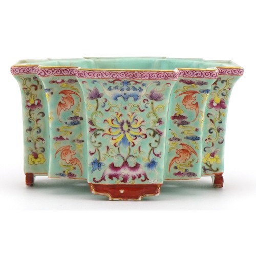 306 - Chinese porcelain four footed planter having a turquoise glaze hand painted in the famille rose pale... 