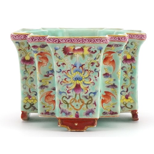 306 - Chinese porcelain four footed planter having a turquoise glaze hand painted in the famille rose pale... 