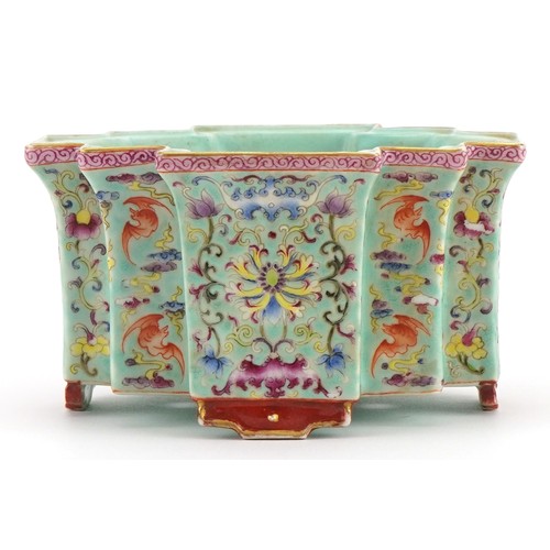 306 - Chinese porcelain four footed planter having a turquoise glaze hand painted in the famille rose pale... 