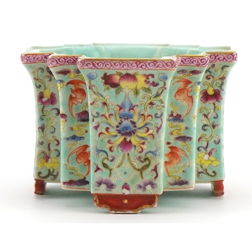 306 - Chinese porcelain four footed planter having a turquoise glaze hand painted in the famille rose pale... 