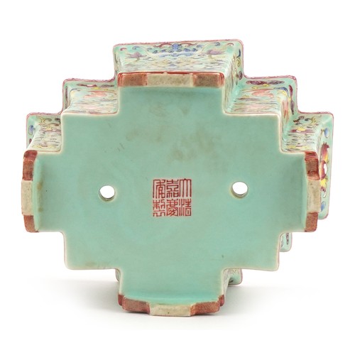 306 - Chinese porcelain four footed planter having a turquoise glaze hand painted in the famille rose pale... 