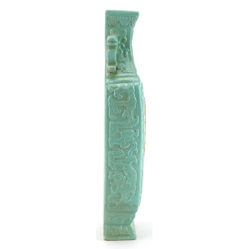 390 - Chinese porcelain wall vase with animalia handles having a turquoise glaze hand painted with calligr... 