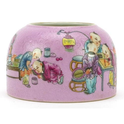 461 - Chinese porcelain beehive water pot having a pink glaze hand painted with children playing, six figu... 