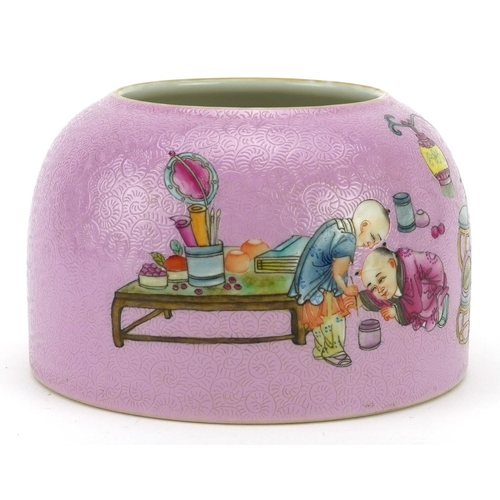 461 - Chinese porcelain beehive water pot having a pink glaze hand painted with children playing, six figu... 