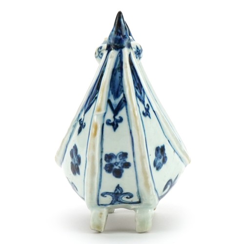 2631 - Chinese Islamic blue and white porcelain four footed candle holder hand painted with flowers, 20cm i... 