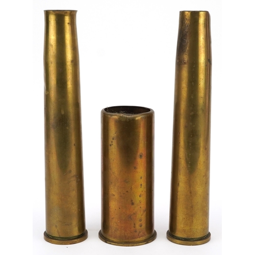 1397 - Three military interest trench shells including a pair, the largest each 31cm high