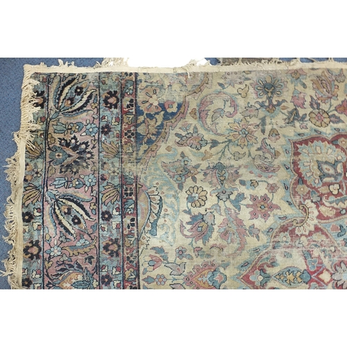 2198 - Rectangular cream ground rug having an all over floral design, 300cm x 165cm