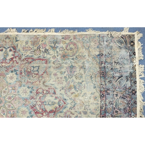 2198 - Rectangular cream ground rug having an all over floral design, 300cm x 165cm